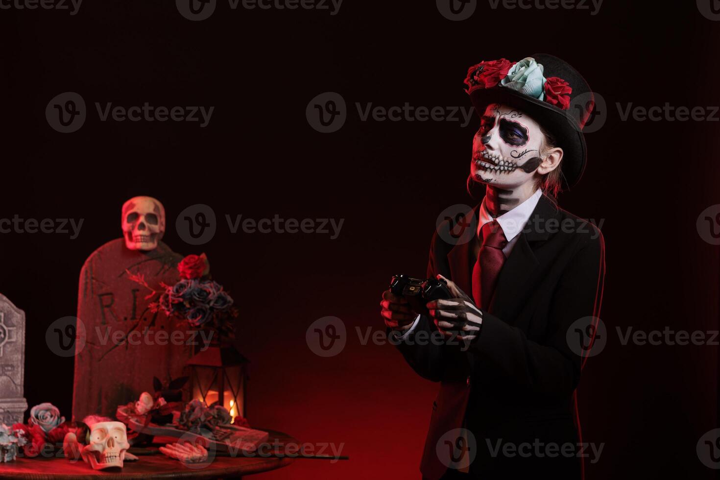 Goddess of death losing at video games play feeling sad, wearing holy day of the dead costume to celebrate mexican tradition. Woman playing online competition with la cavalera catrina make up. photo
