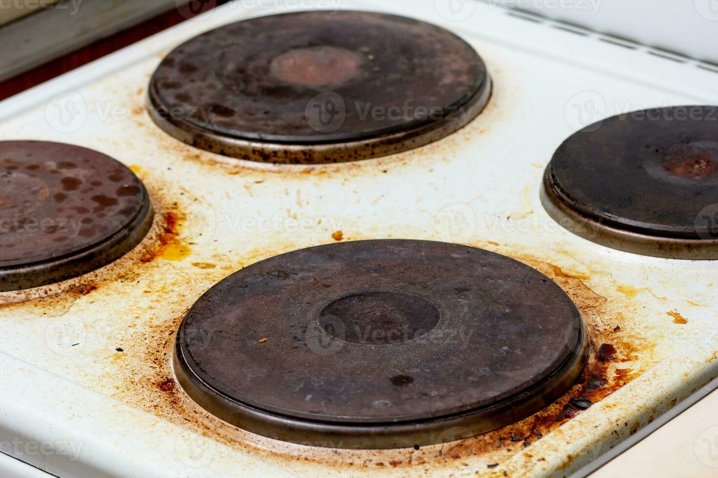 Dirty electric stove with fat on surface photo