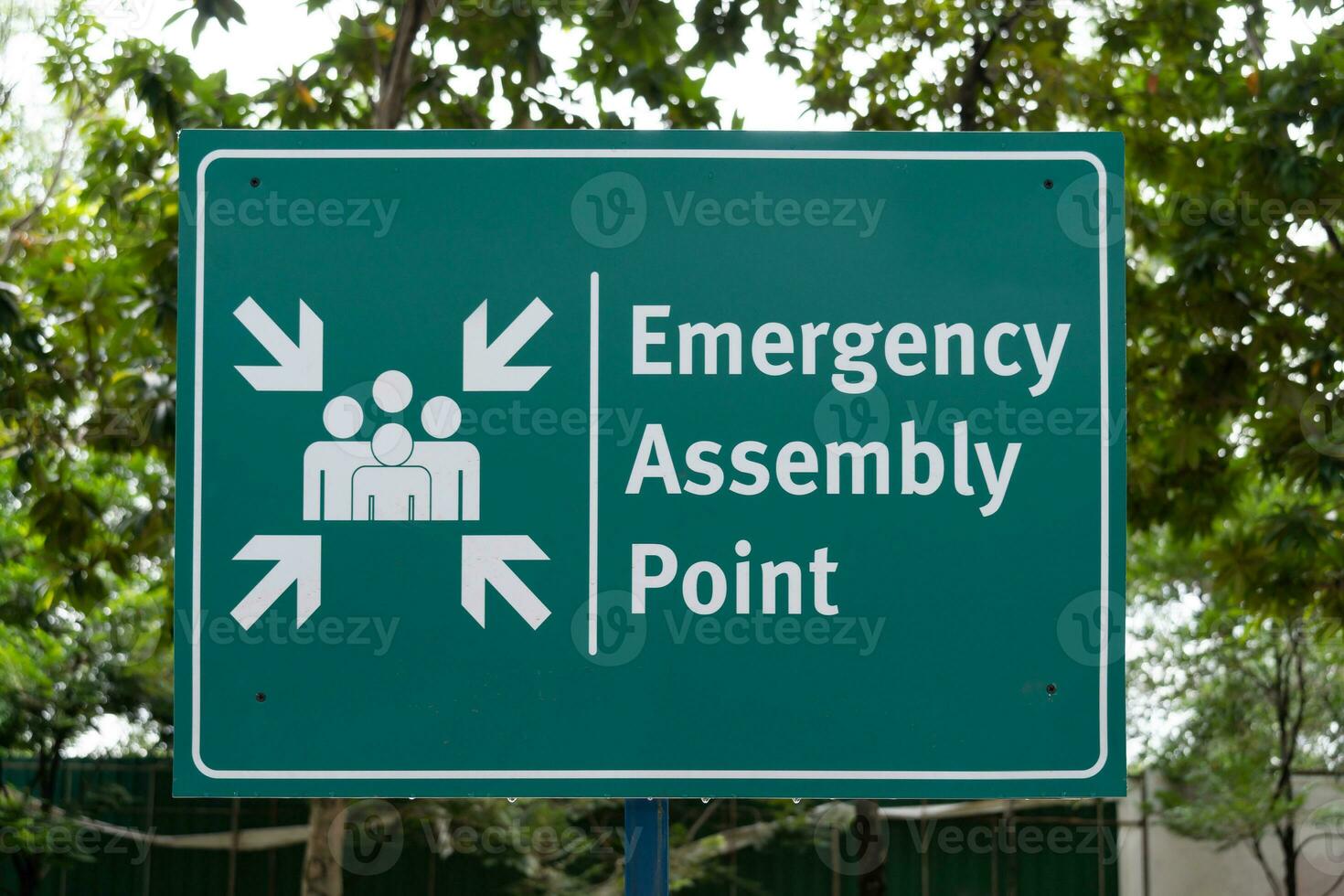 Emergency assembly point sign in the park. photo