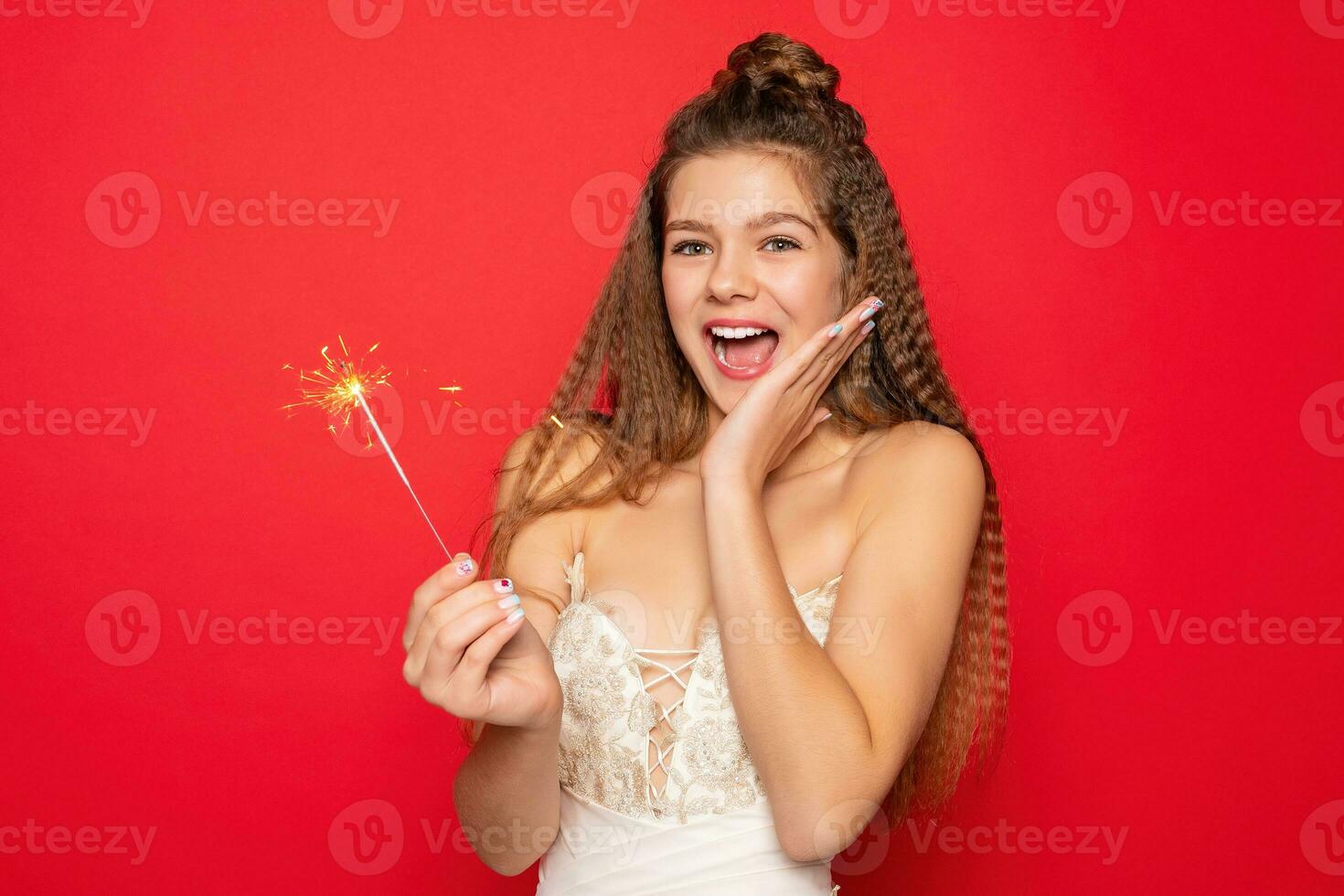 teenage girl happy woman with sparklers celebrate photo