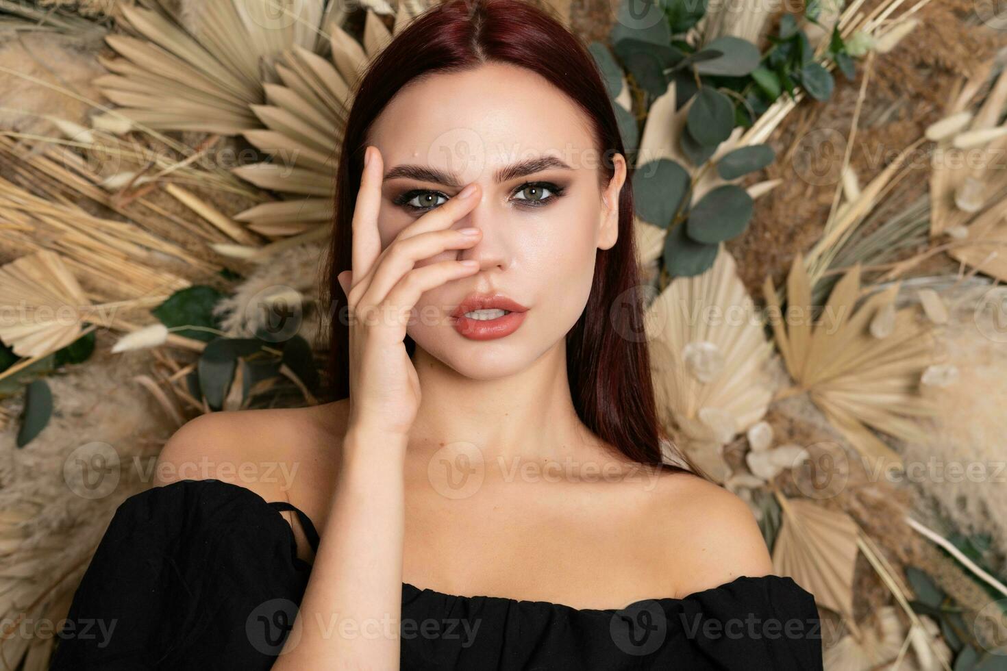 Closeup portrait of young beautiful woman with a healthy skin of the face. photo