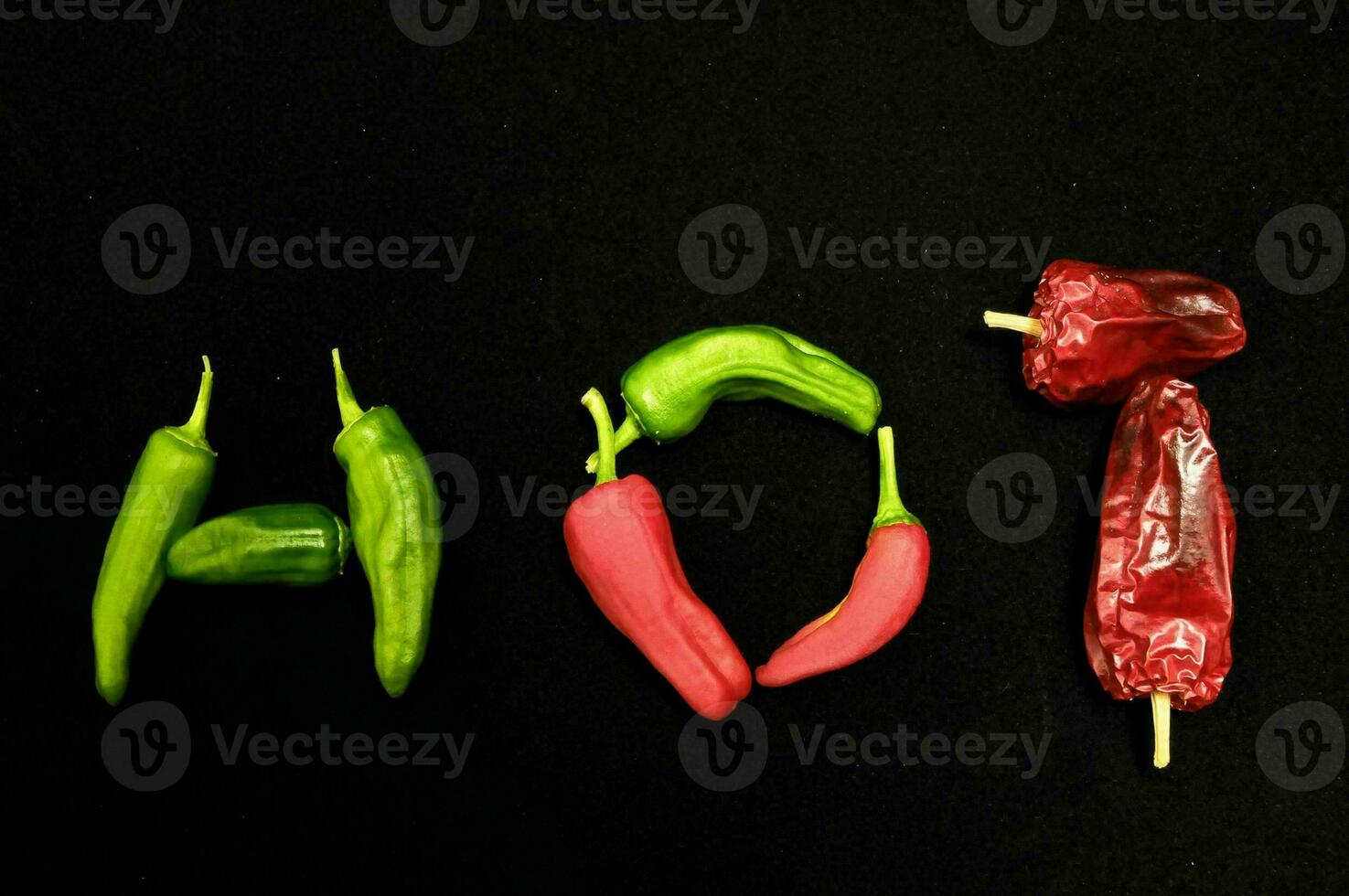 the word hot spelled out of peppers photo