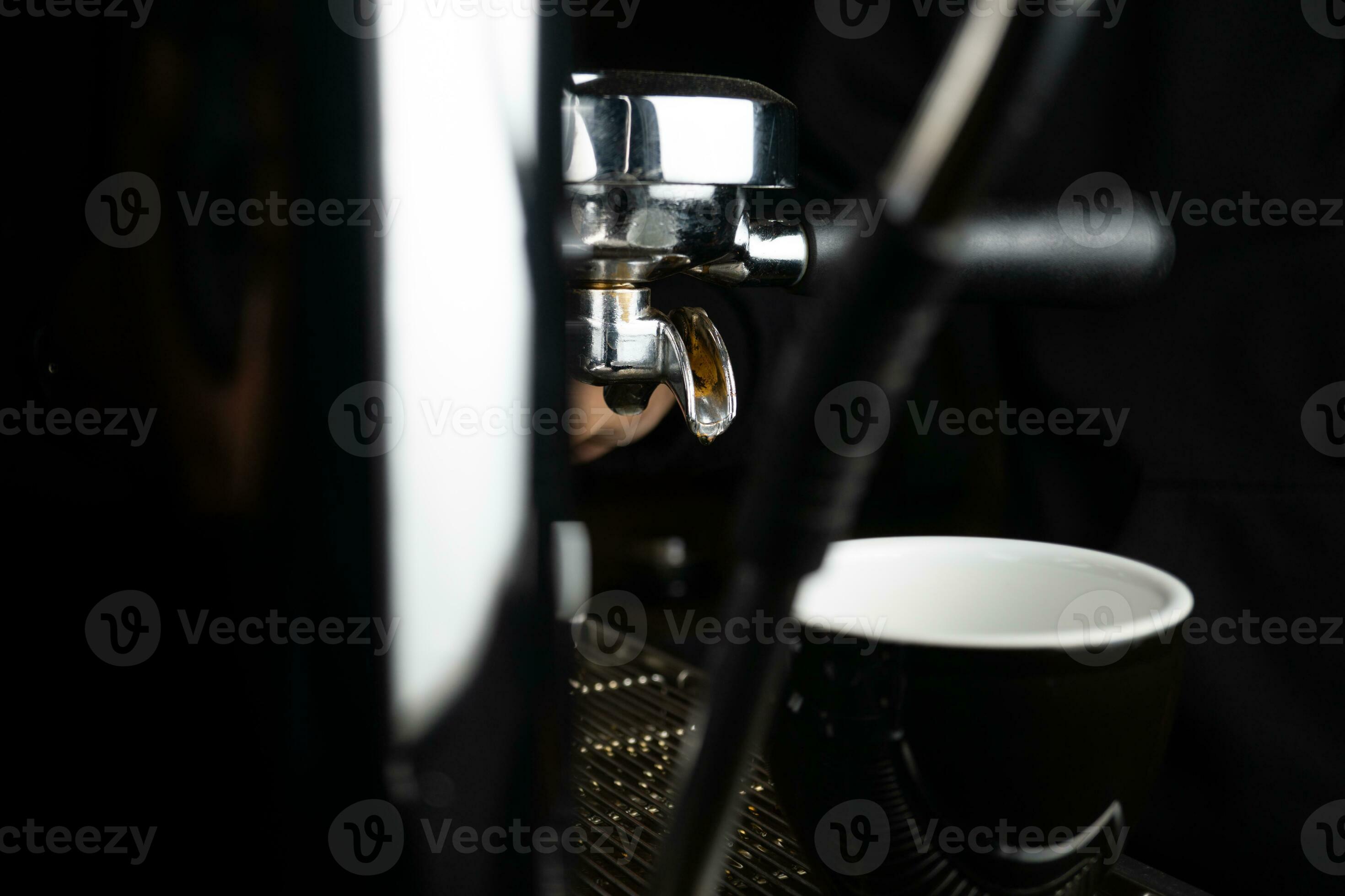 Espresso drip shot with double spout portafilter from coffee machine