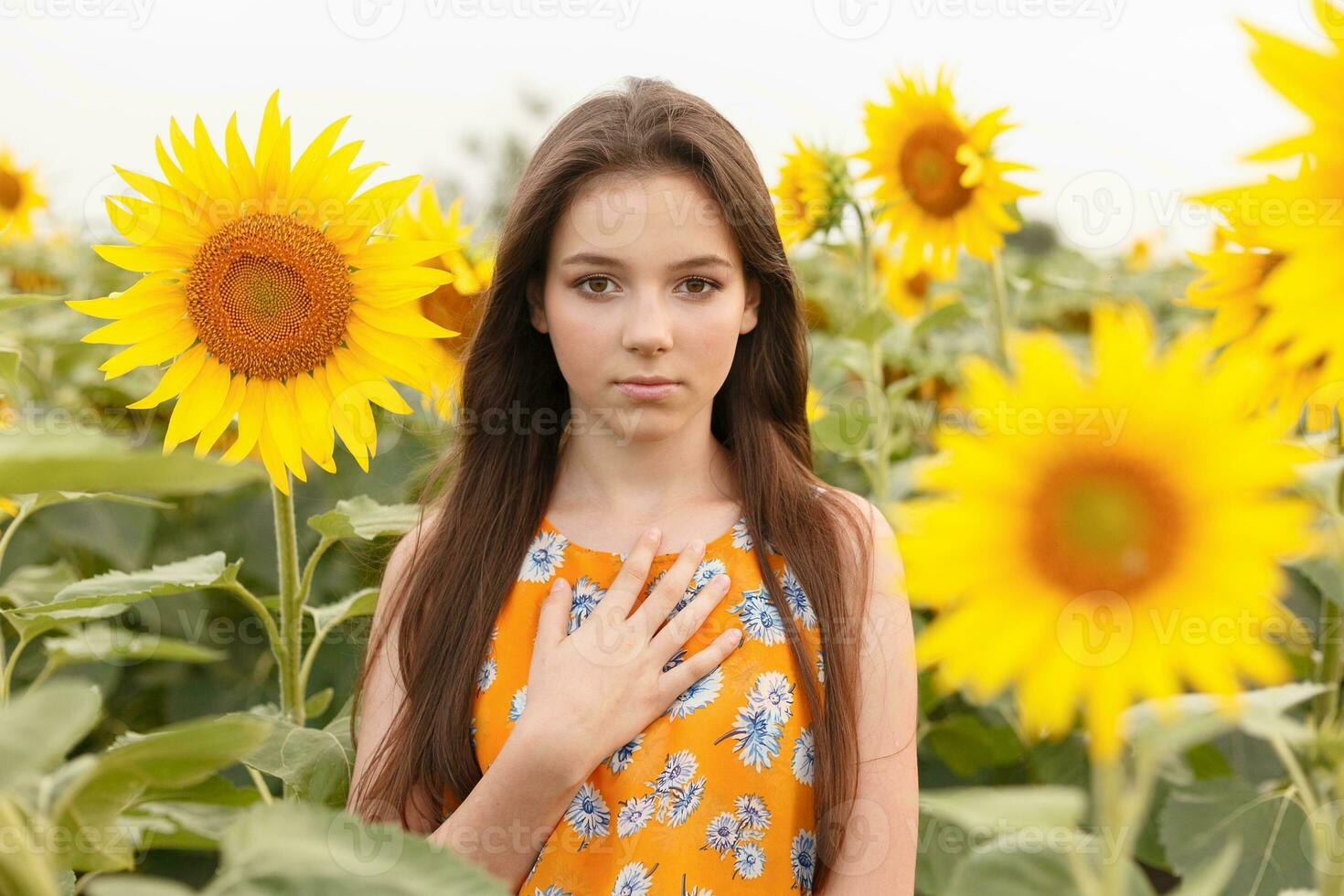 Young beautiful woman enjoying summer photo