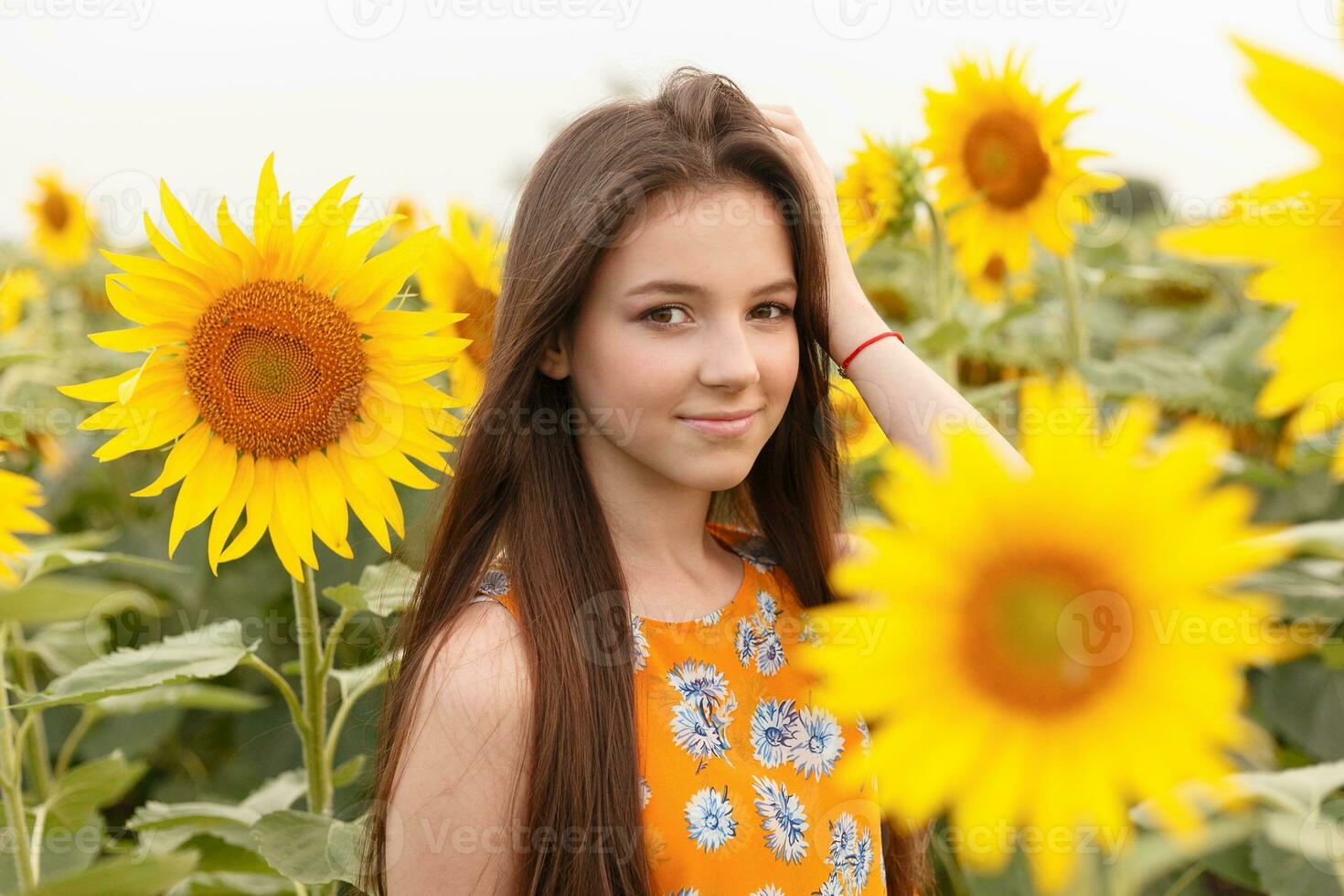 Young beautiful woman enjoying summer photo