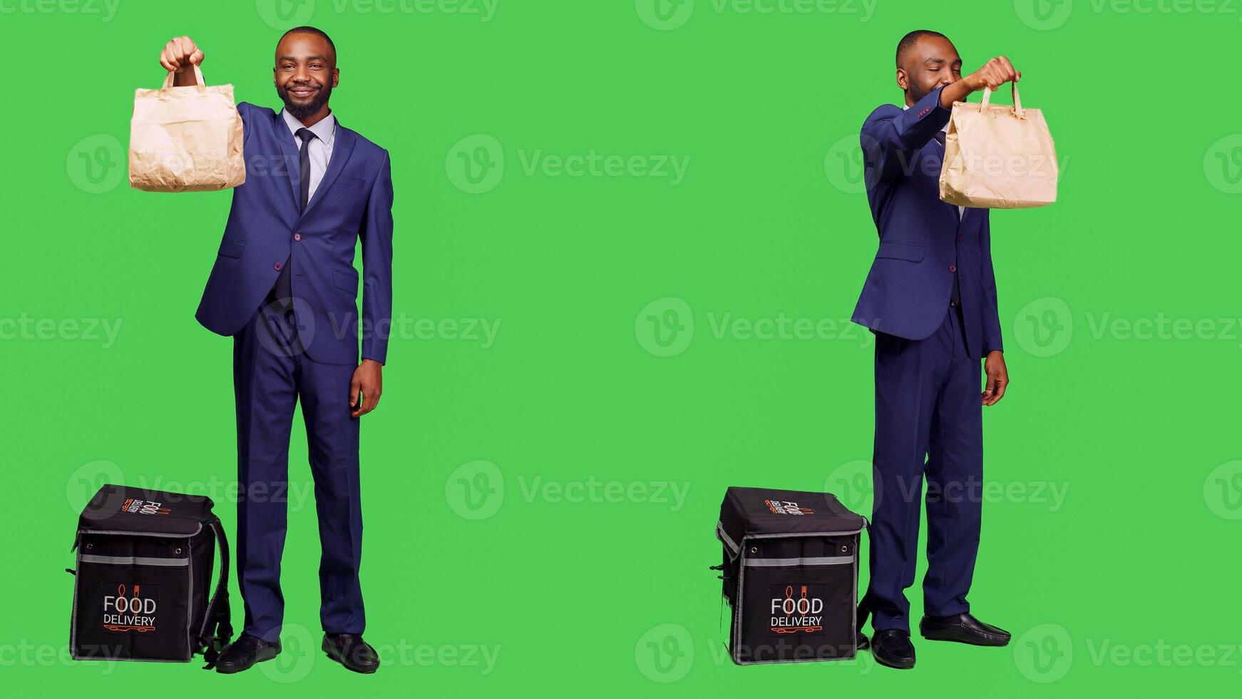 Corporate employee working as deliveryman in studio, having backpack to deliver fast food meal from takeaway order. Young businessman carrying thermal bag with takeout meal on greenscreen. photo