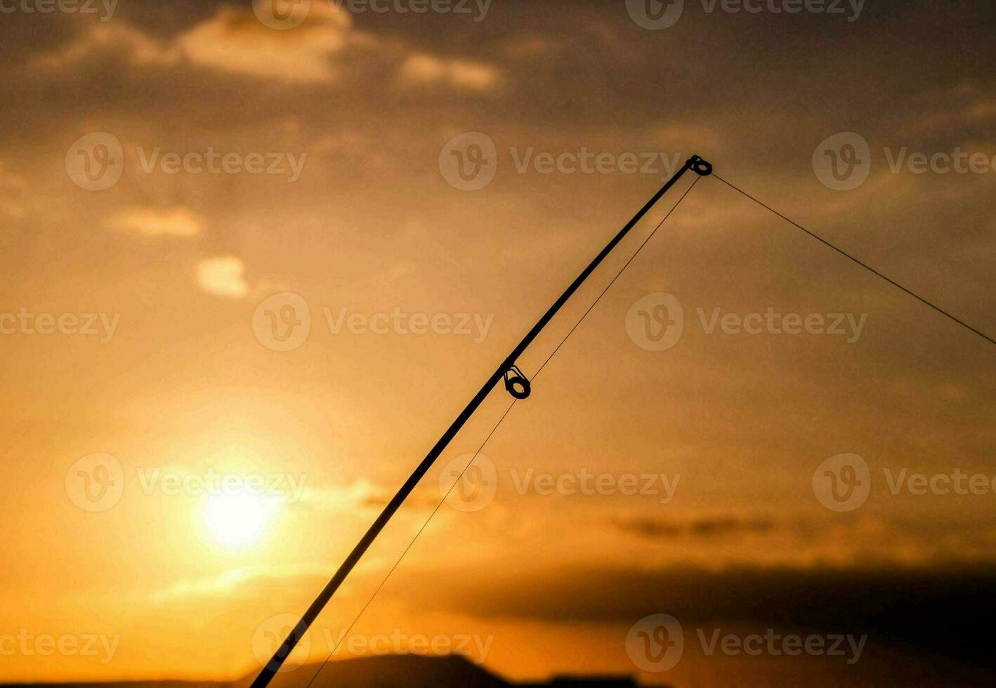 Fishing at sunset photo