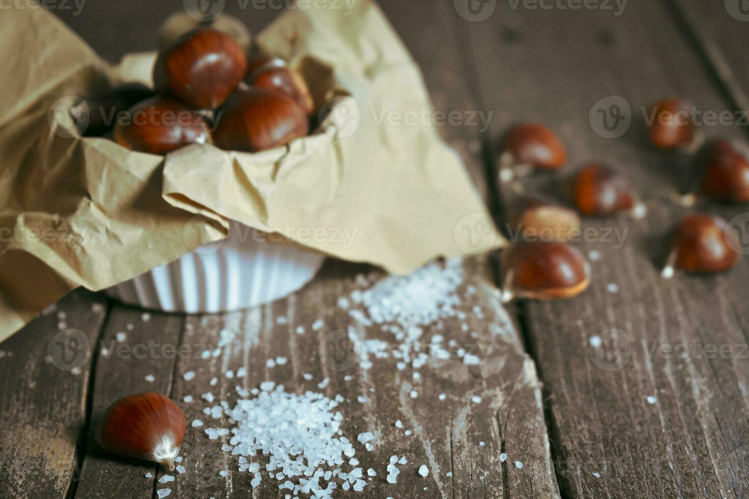 Chestnut on wooden Table Background photo