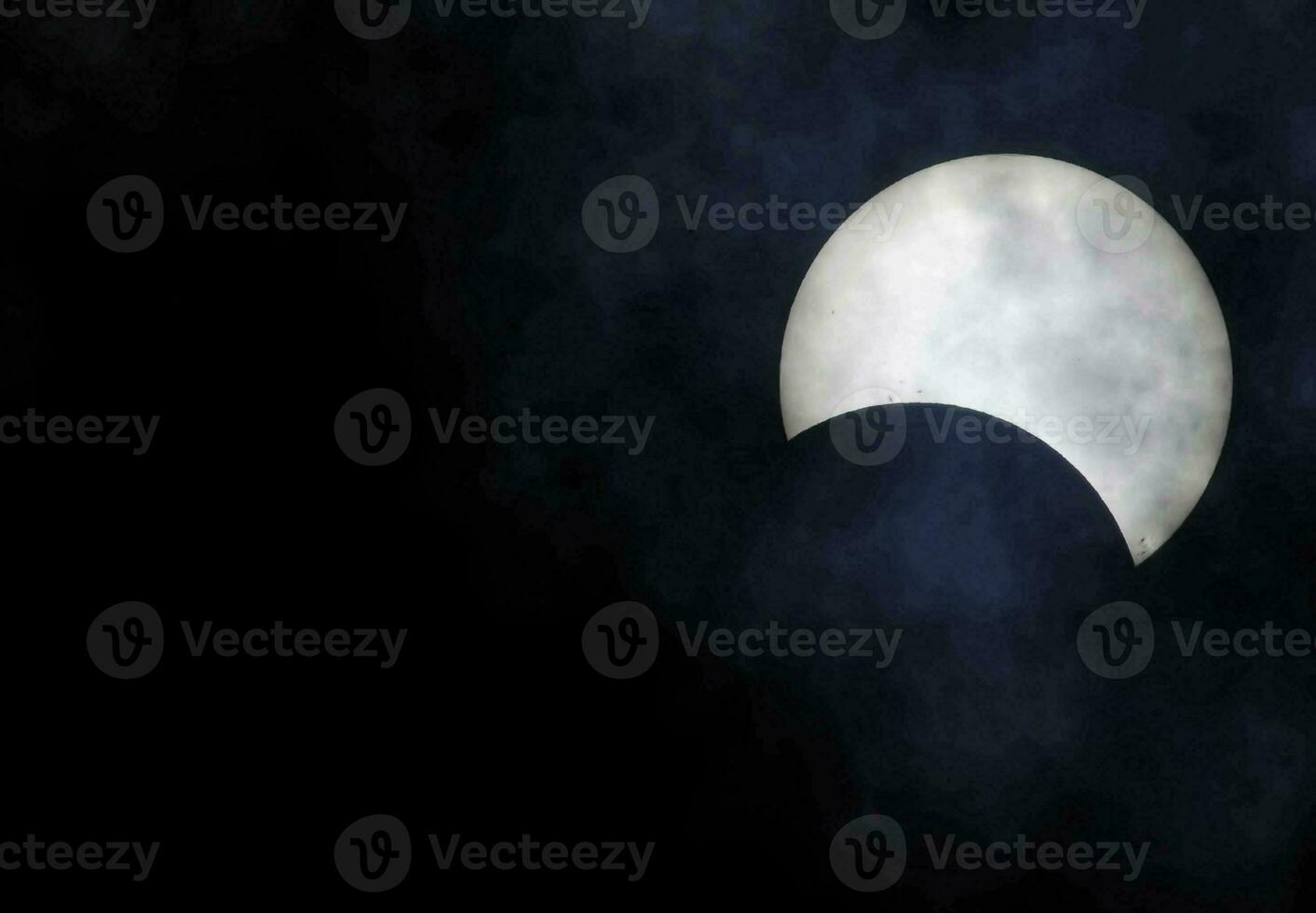 Moon in the night sky photo