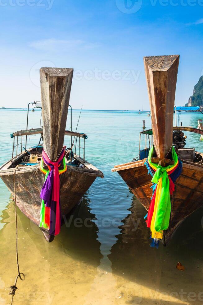 Long boat and tropical beach, Andaman Sea,Phi Phi Islands,Thailand photo