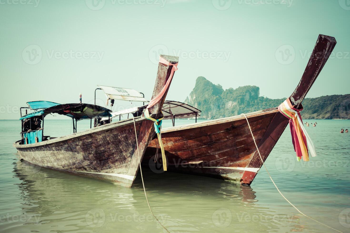 Long boat and tropical beach, Andaman Sea,Phi Phi Islands,Thailand photo