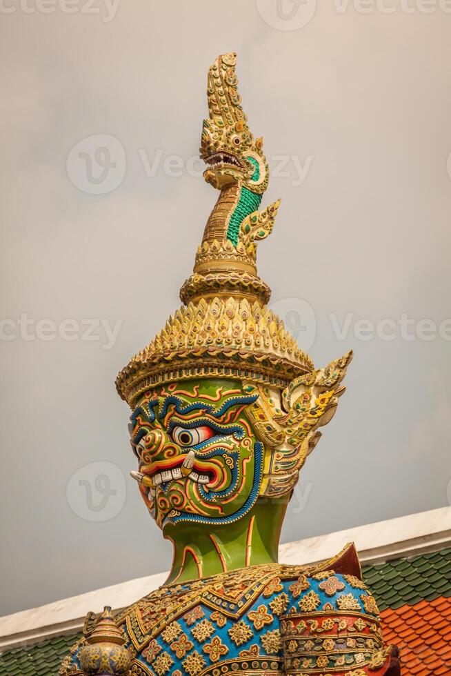 Statue in Wat Phra Kaew at Bangkok Thailand photo