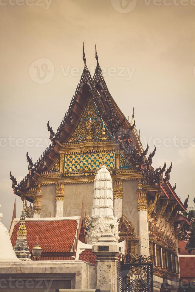 Wat Intharawihan buddhist temple in Bangkok holds the tallest standing buddha in the world. photo