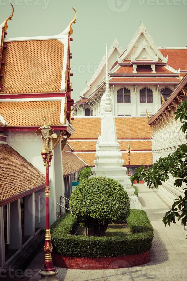 Typical buddhist monastery roof, Thailand photo
