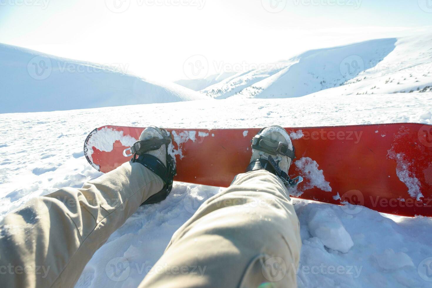 Winter sport concept with person on top of the mountain ready to ride down photo