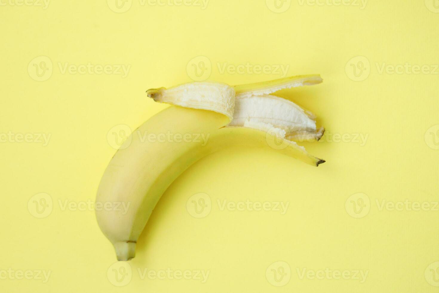 Fresh Banana on yellow background photo