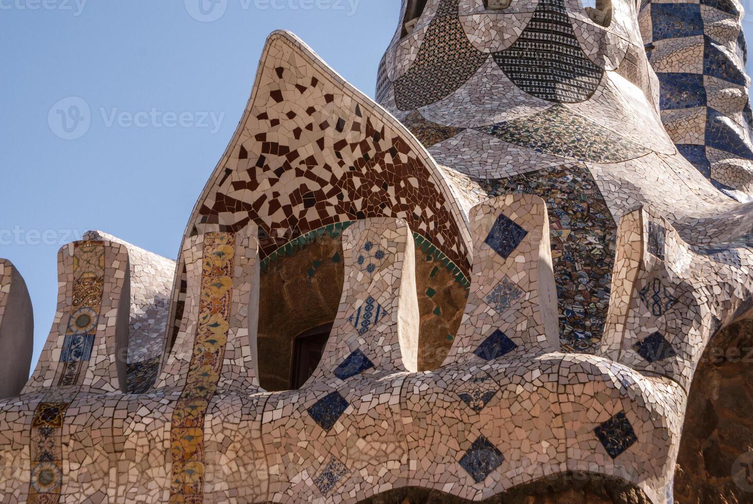 Barcelona park Guell fairy tale mosaic house on entrance photo