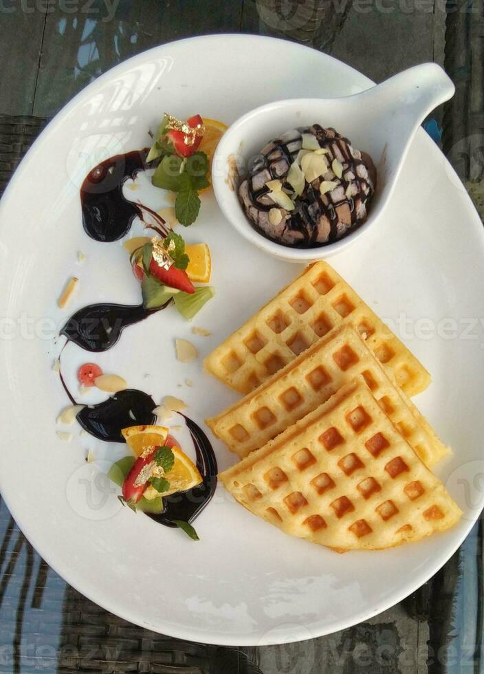 triangular waffle with chocolate ice cream photo