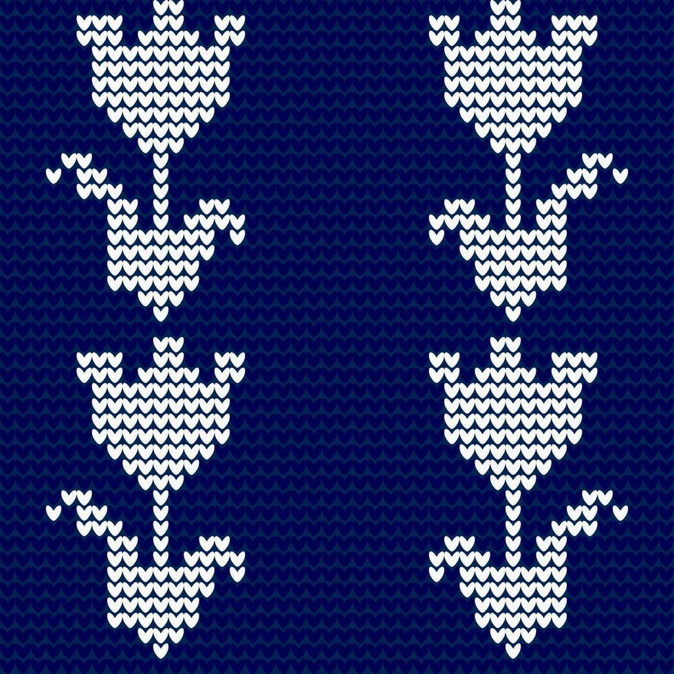 Seamless knitted pattern with flowers. Vector illustration. Blue background.