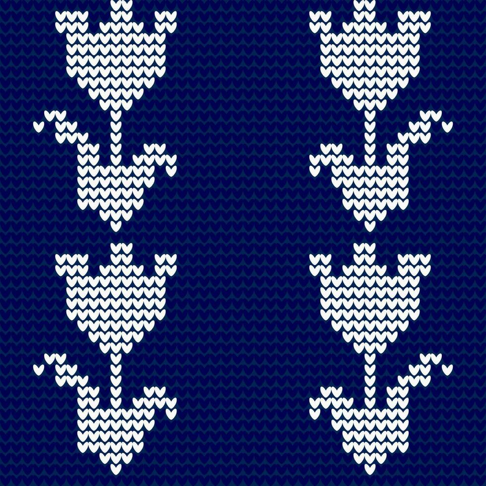 Seamless knitted pattern with flowers. Vector illustration. Blue background.