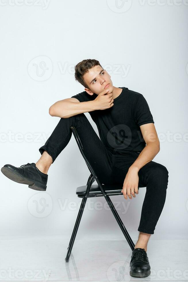 Man wearing black t-shirt photo