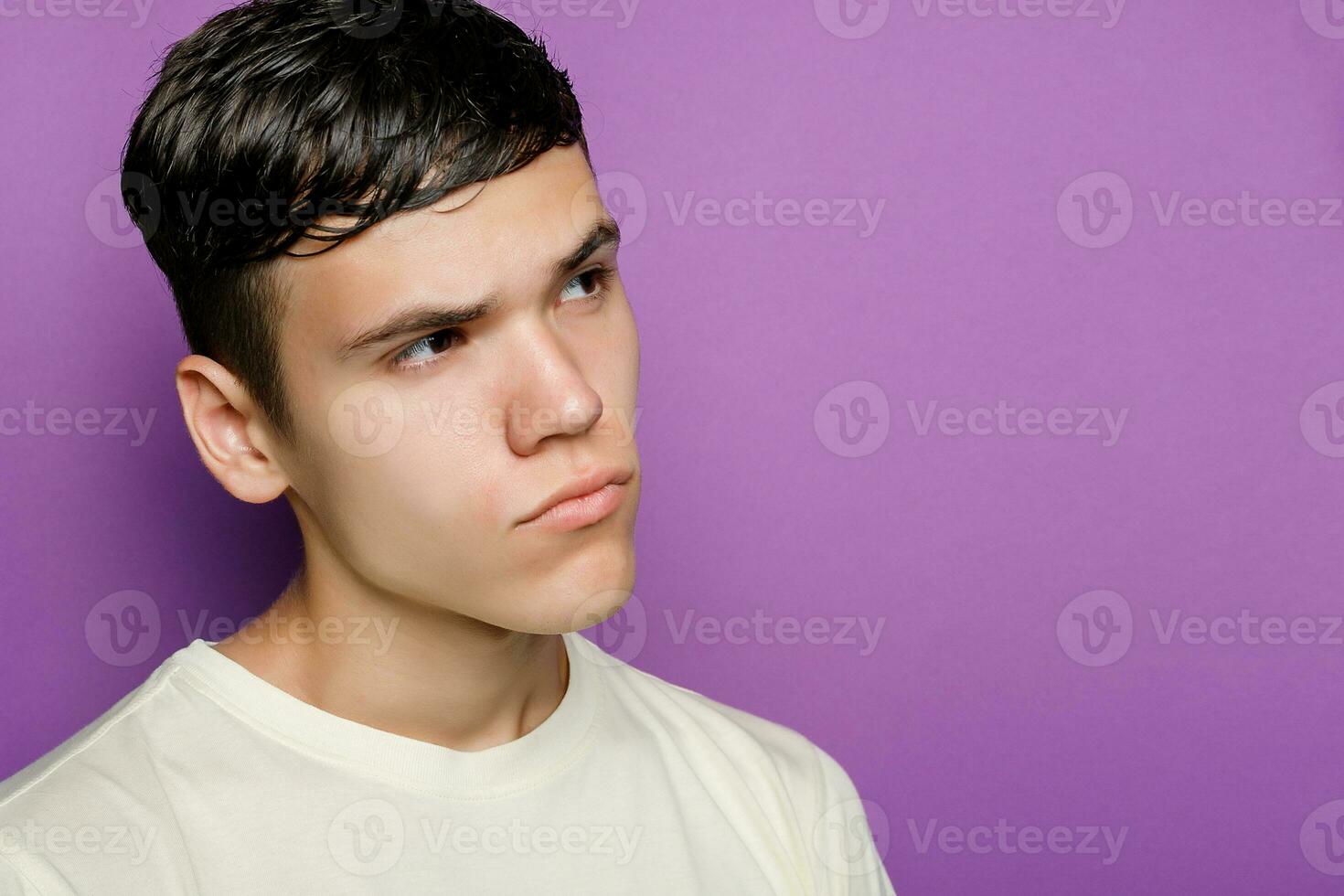 Indoor shot of handsome muscular guy with positive expression photo
