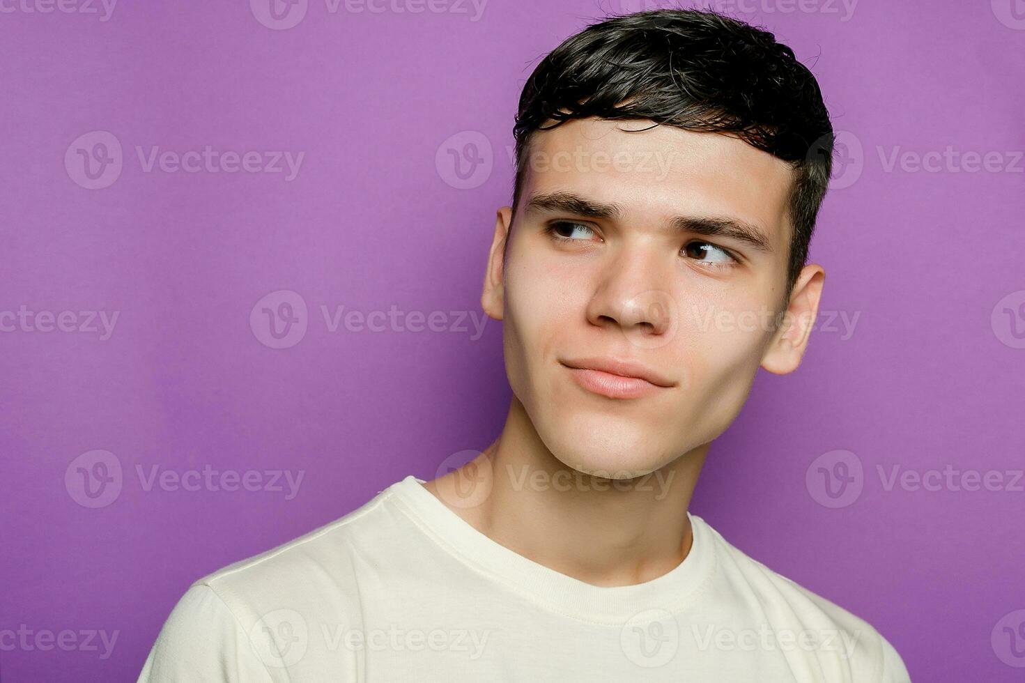 Indoor shot of handsome muscular guy with positive expression photo