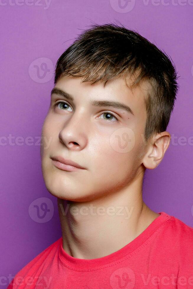 Indoor shot of handsome muscular guy with positive expression photo