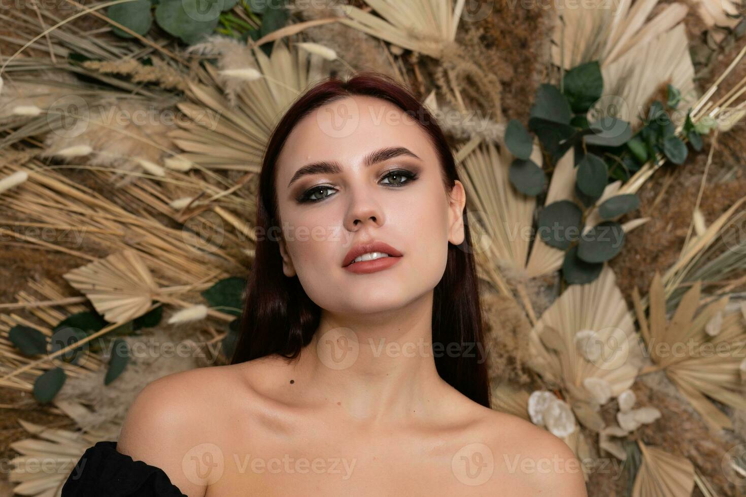 Closeup portrait of young beautiful woman with a healthy skin of the face. photo