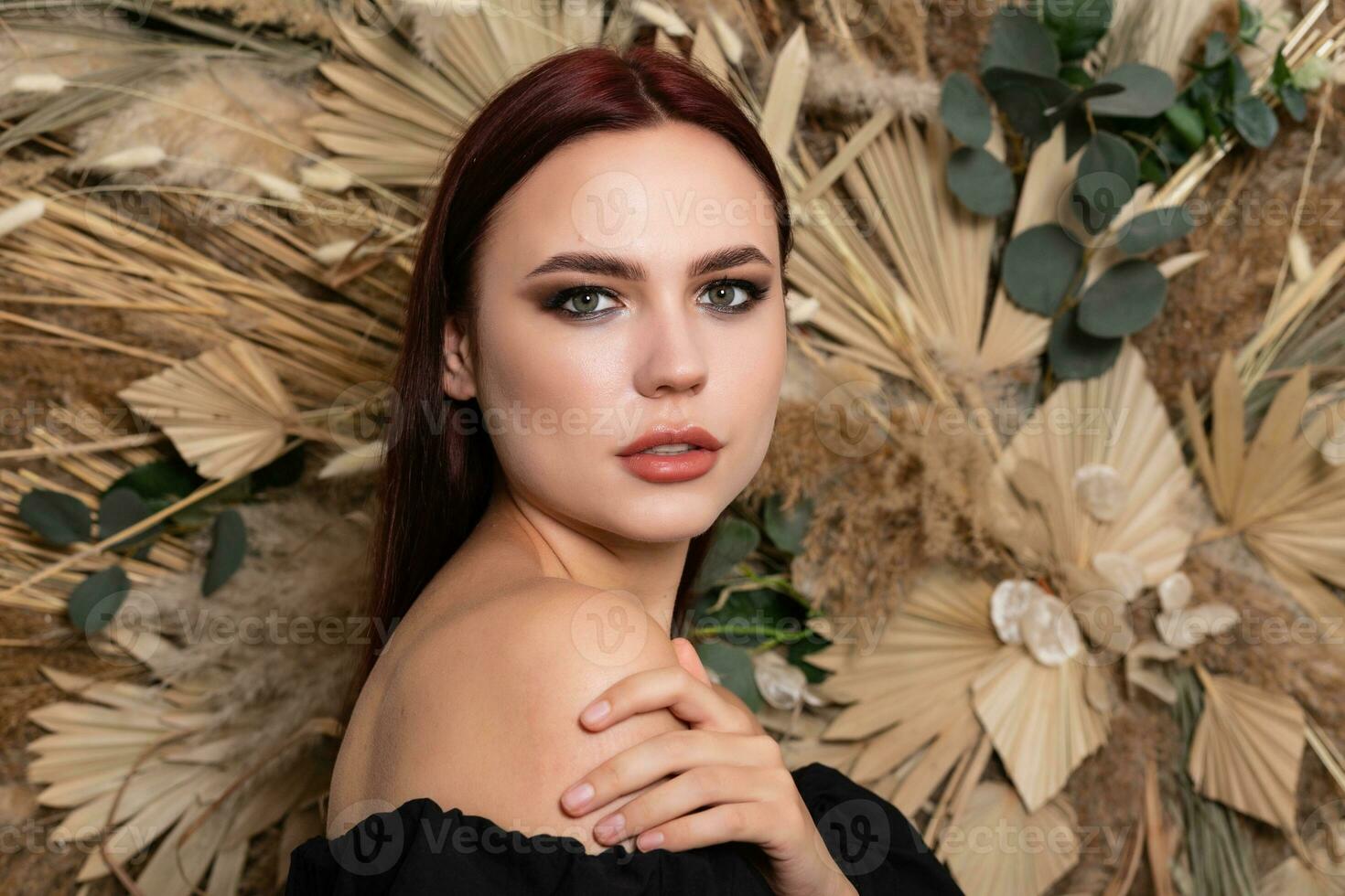 Closeup portrait of young beautiful woman with a healthy skin of the face. photo