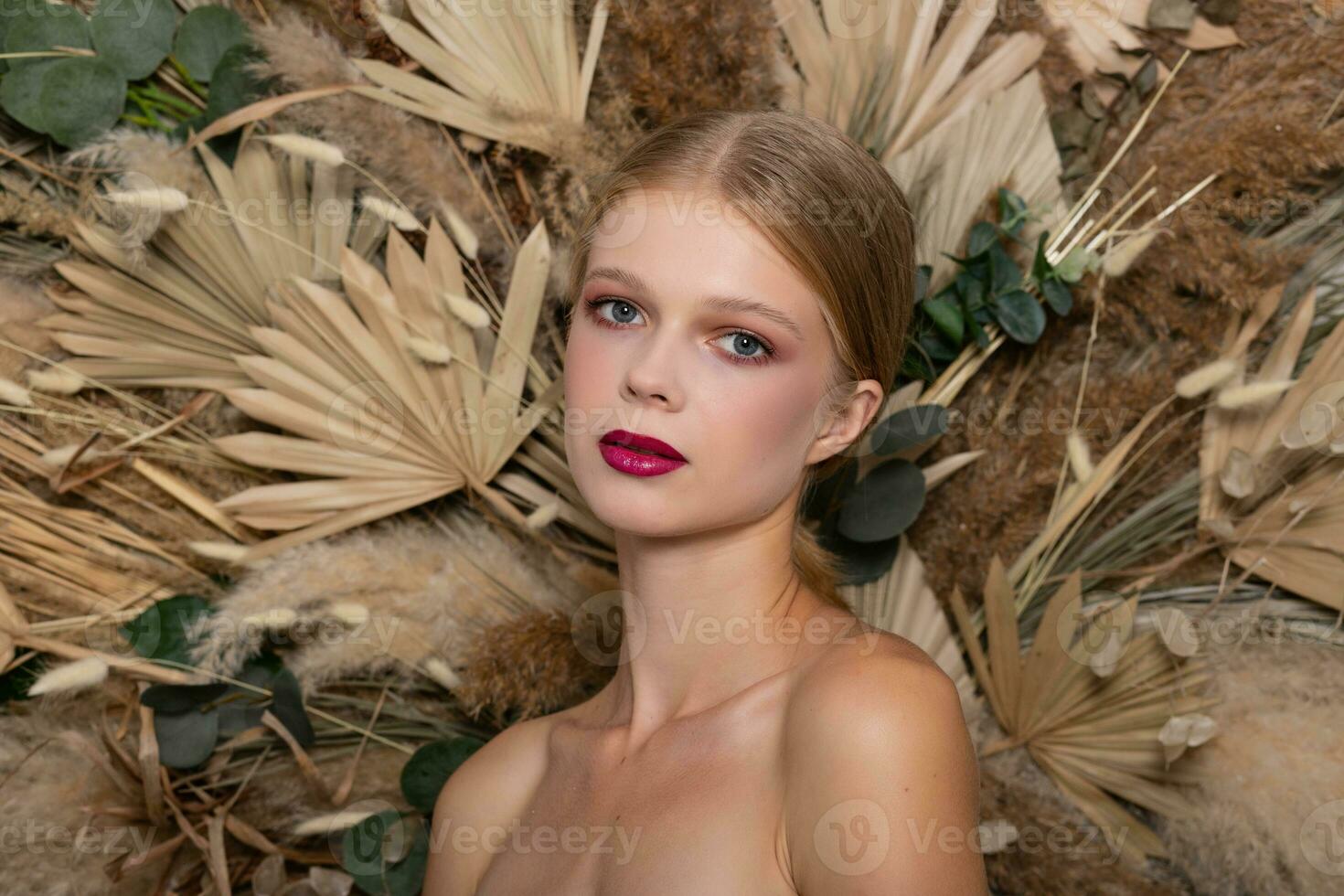 Closeup portrait of young beautiful woman with a healthy skin of the face. photo