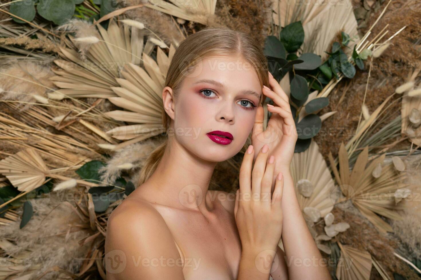 Closeup portrait of young beautiful woman with a healthy skin of the face. photo