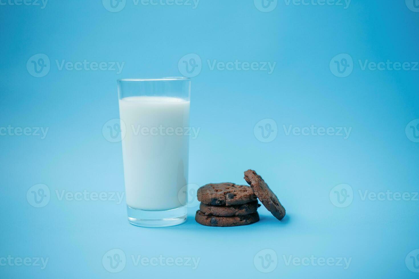 Cookies with chocolate chips on a plate on a table photo