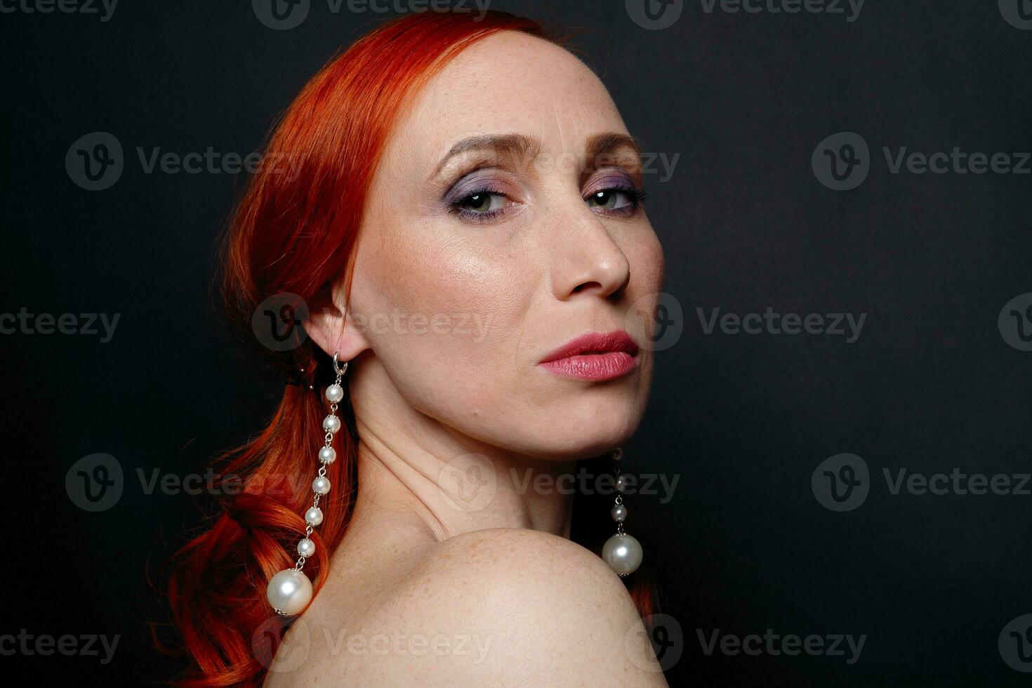 portrait of a beautiful brunette girl with luxury accessories photo