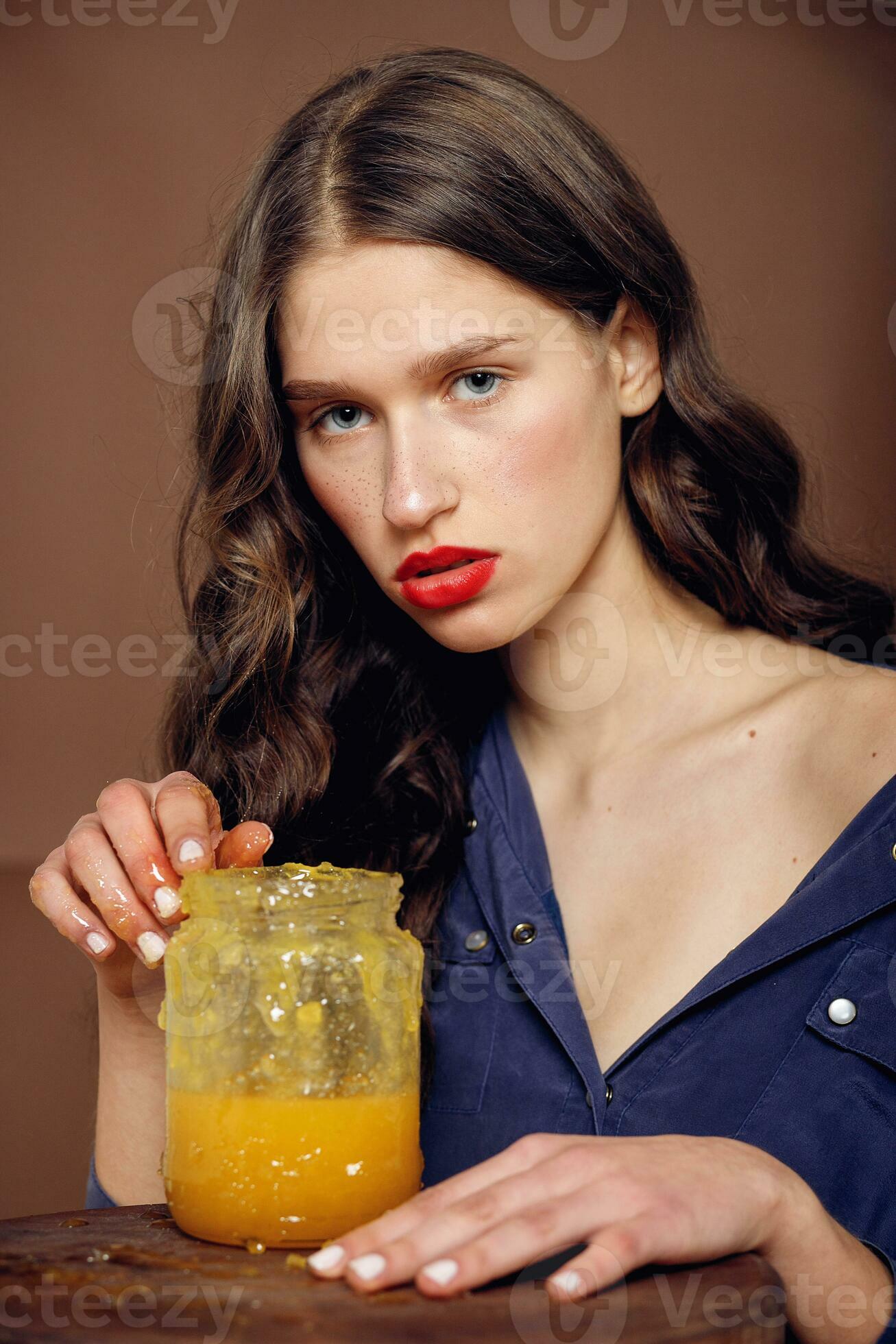 Girl with jar of honey. Healthy food concept, diet, dessert 34216267