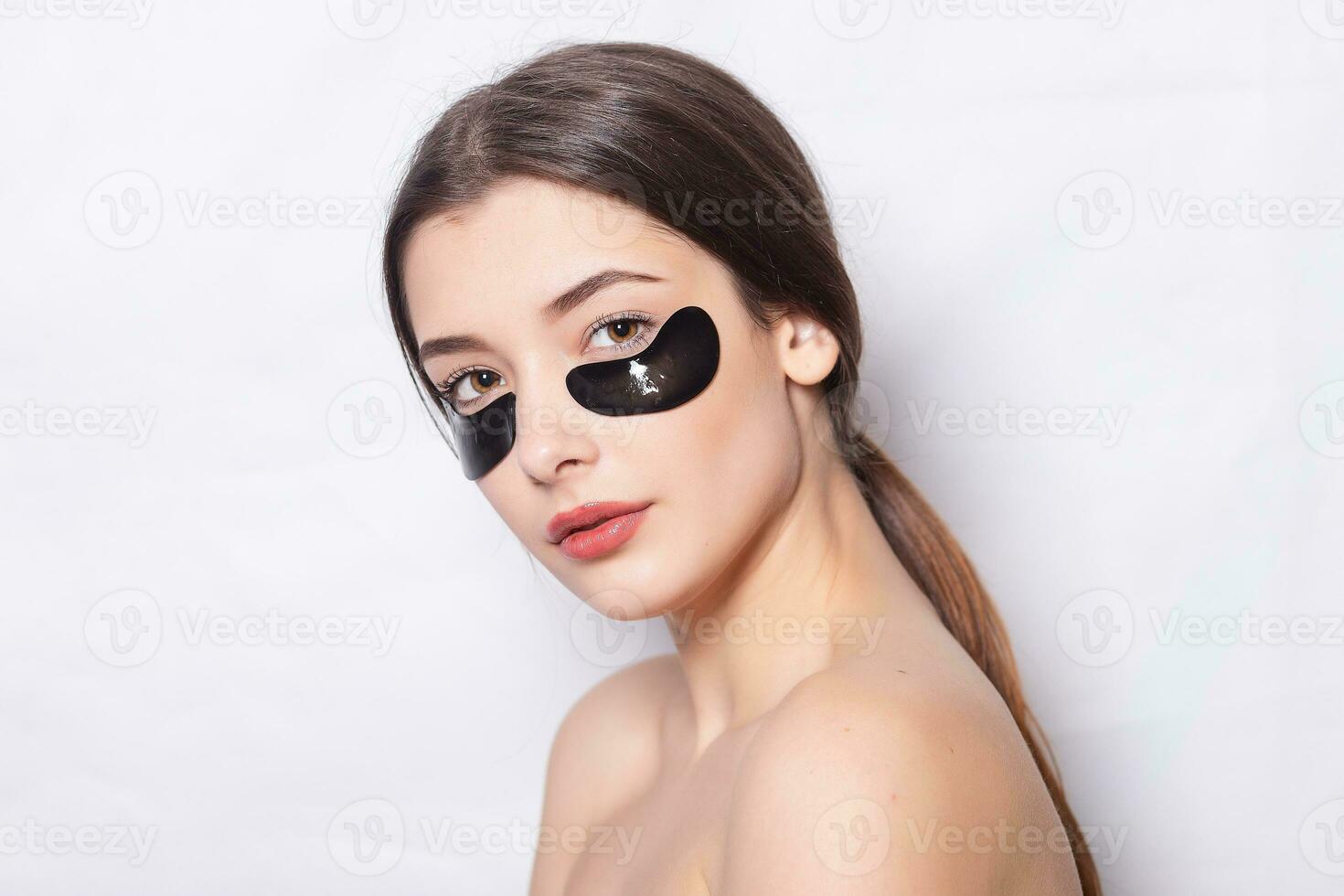 Eye black patch, Beautiful Woman With Natural Makeup photo