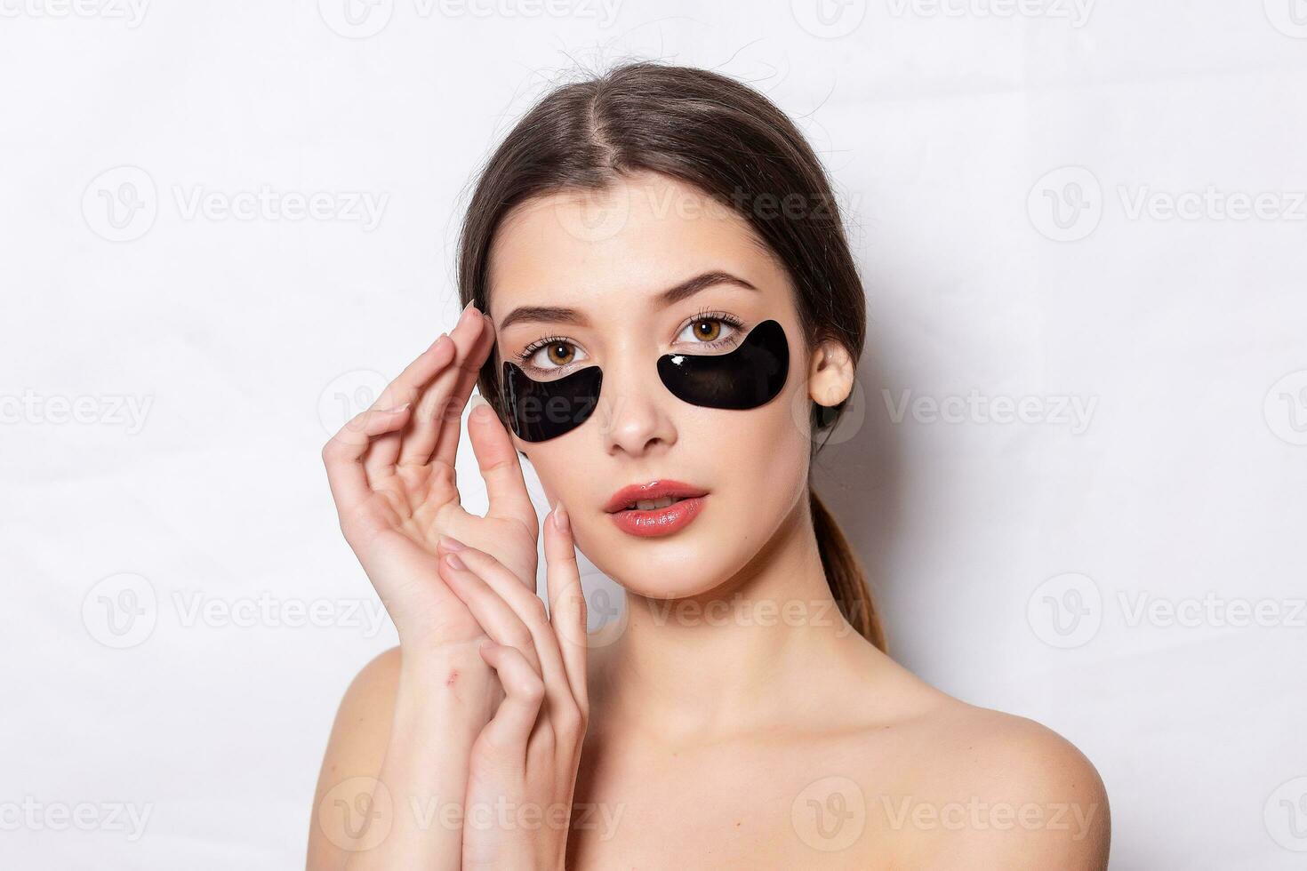 Eye black patch, Beautiful Woman With Natural Makeup photo