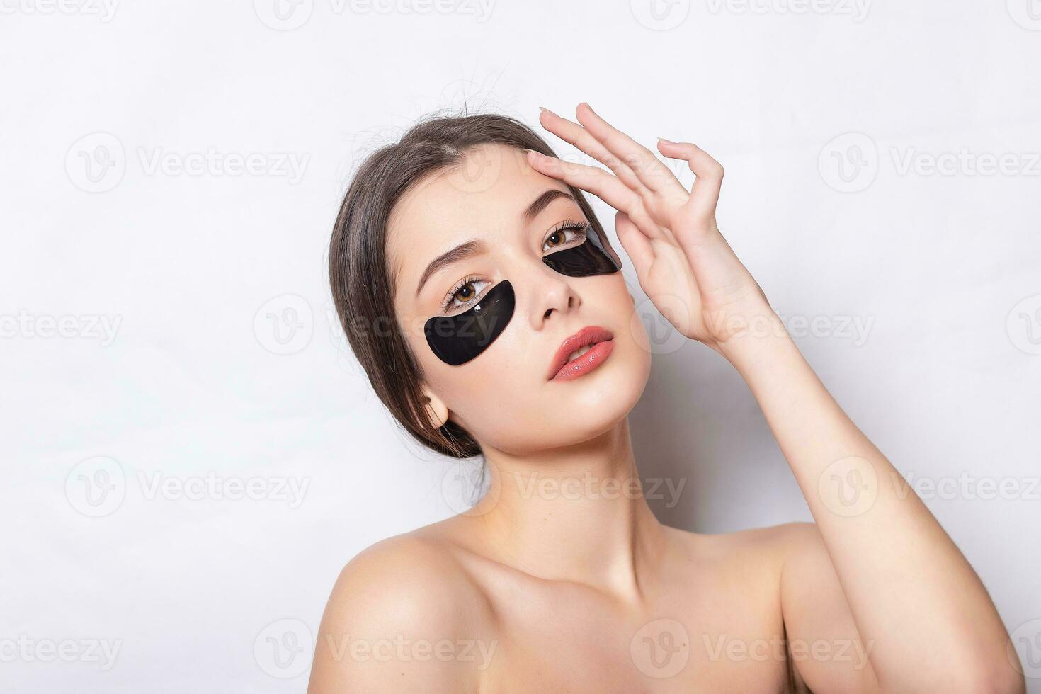Eye black patch, Beautiful Woman With Natural Makeup photo