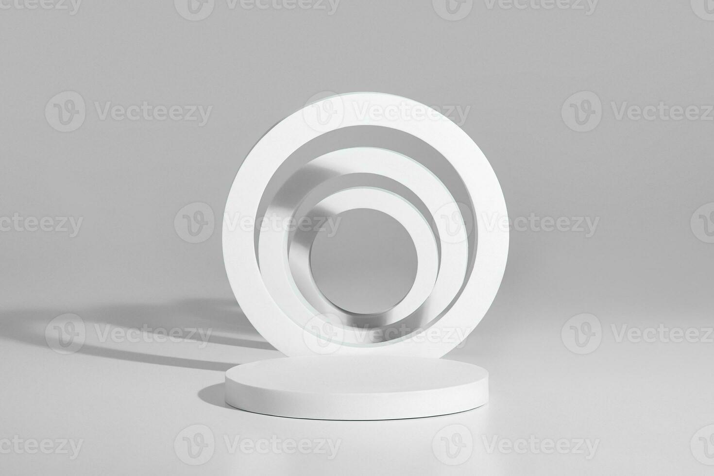 Product podium from cylindrical pedestal with vertical rings on gray background photo