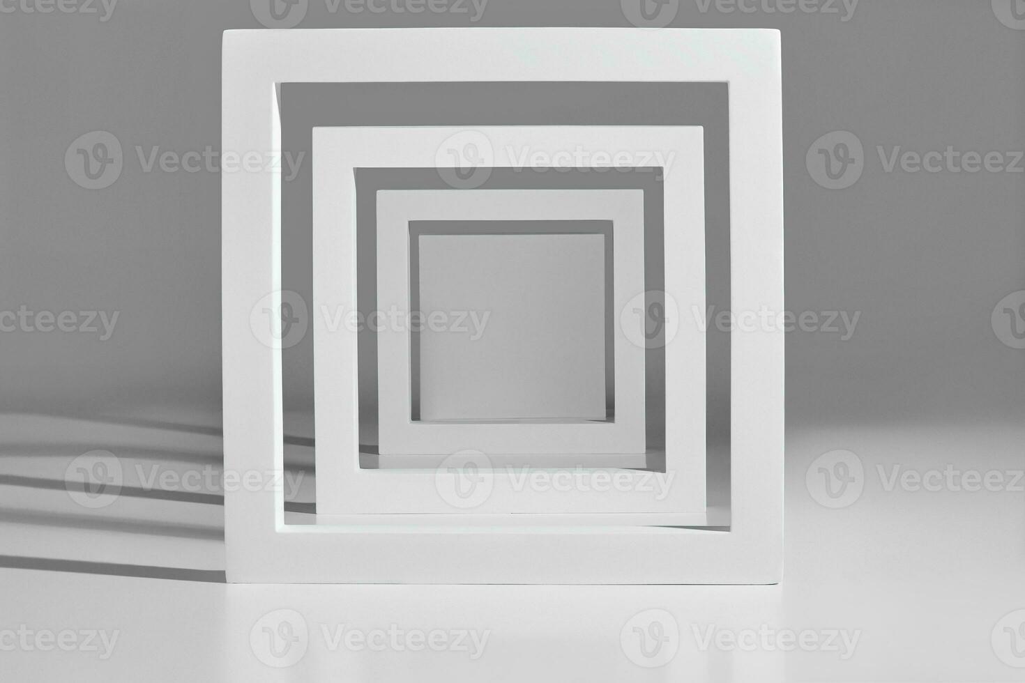 Showcase layout of square frames of different sizes on gray background photo