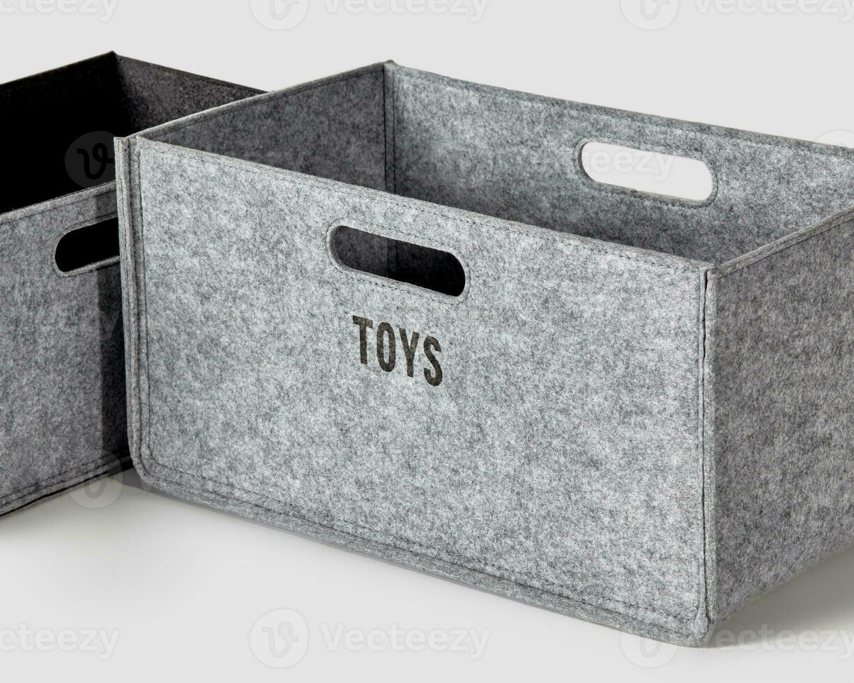 Hand-stitched gray felt storage basket for toys photo