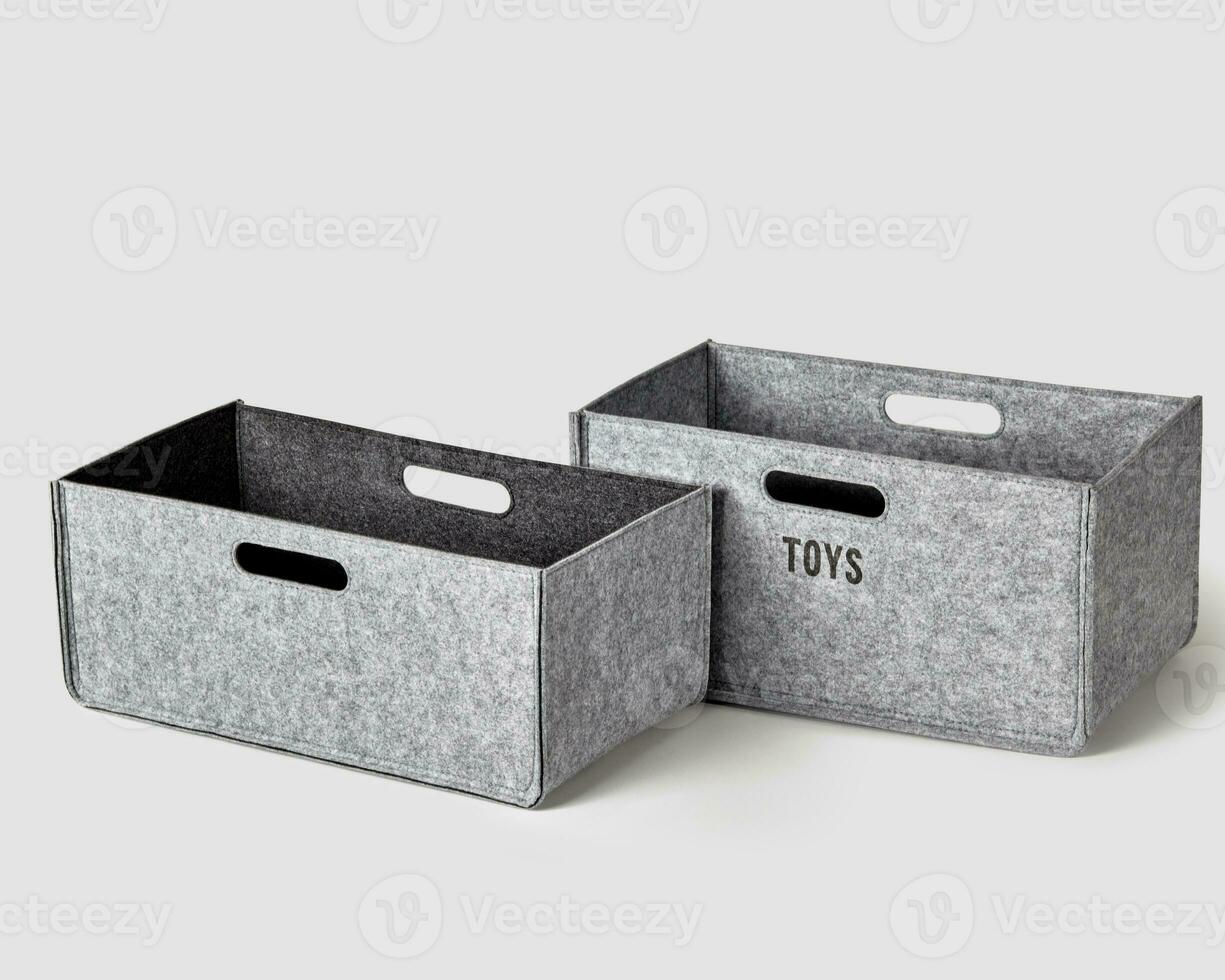 Gray felt baskets with black inscription for storing toys photo
