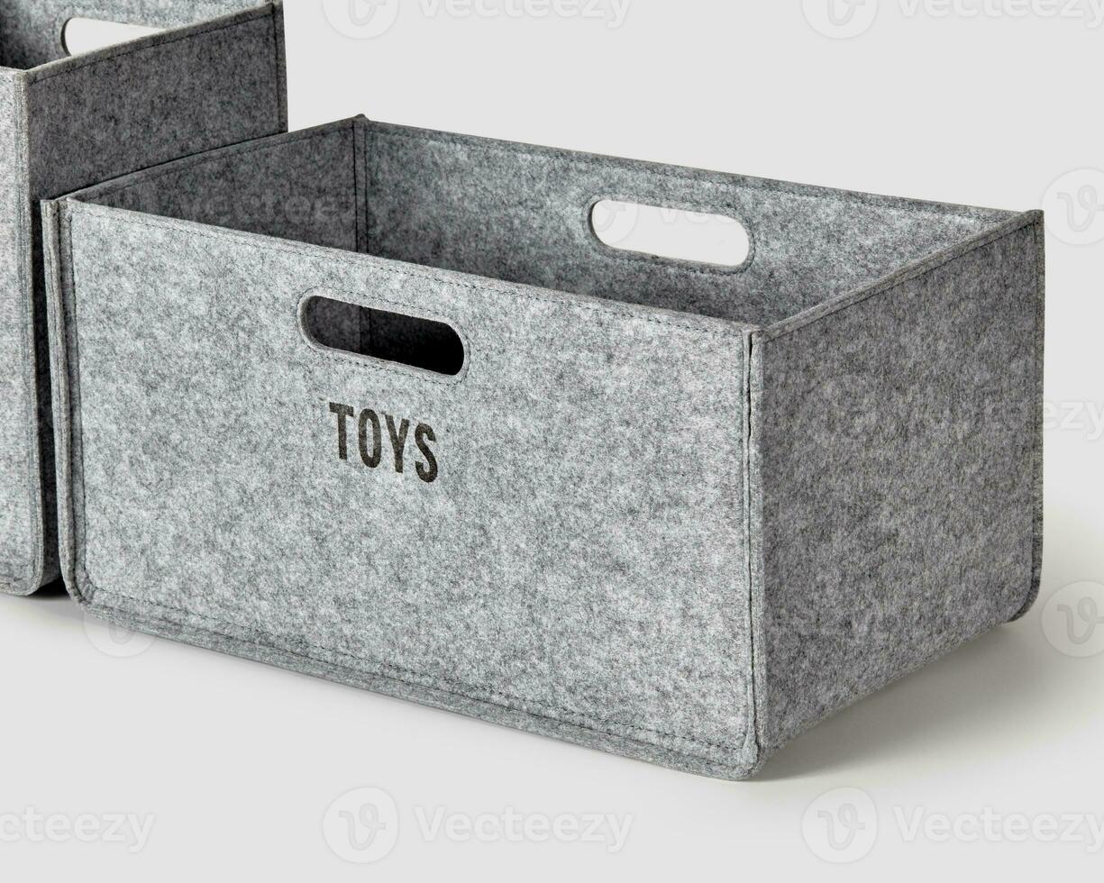 Gray felt storage basket for storing children toys photo