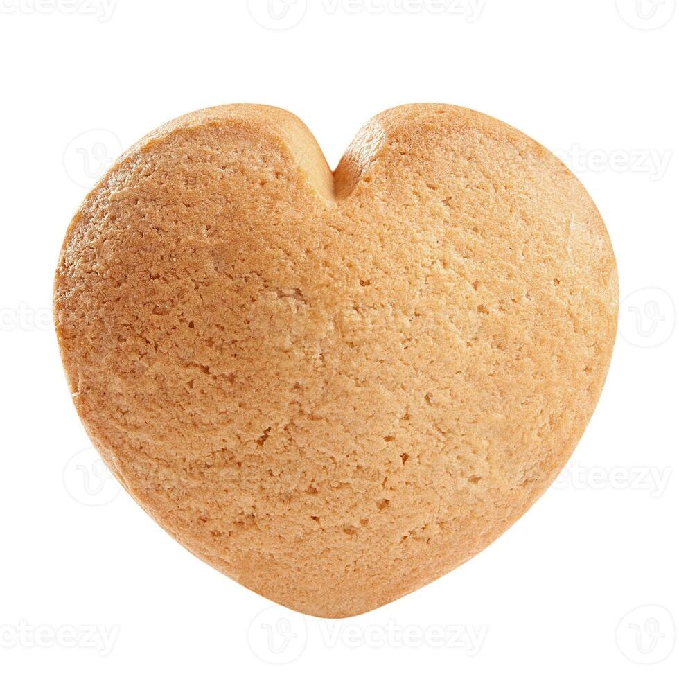 Closeup of heart shaped butter cookie isolated on white background photo