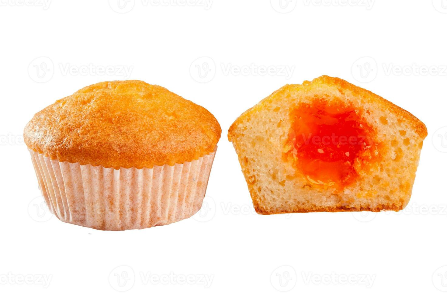 Soft and moist muffin with apricot jam filling isolated on white photo