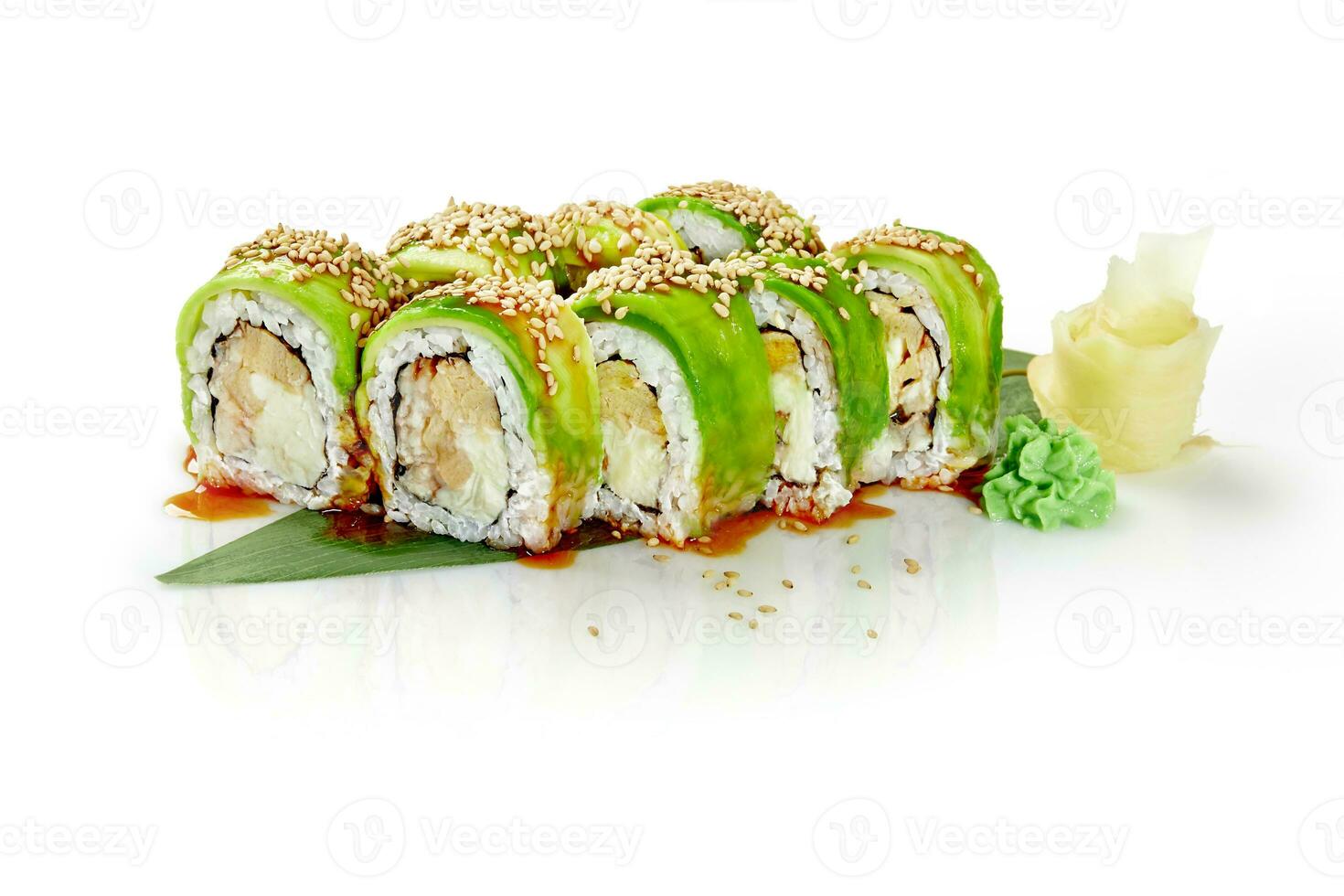 Rolls with eel, tamagoyaki, cream cheese, avocado, unagi sauce and sesame photo