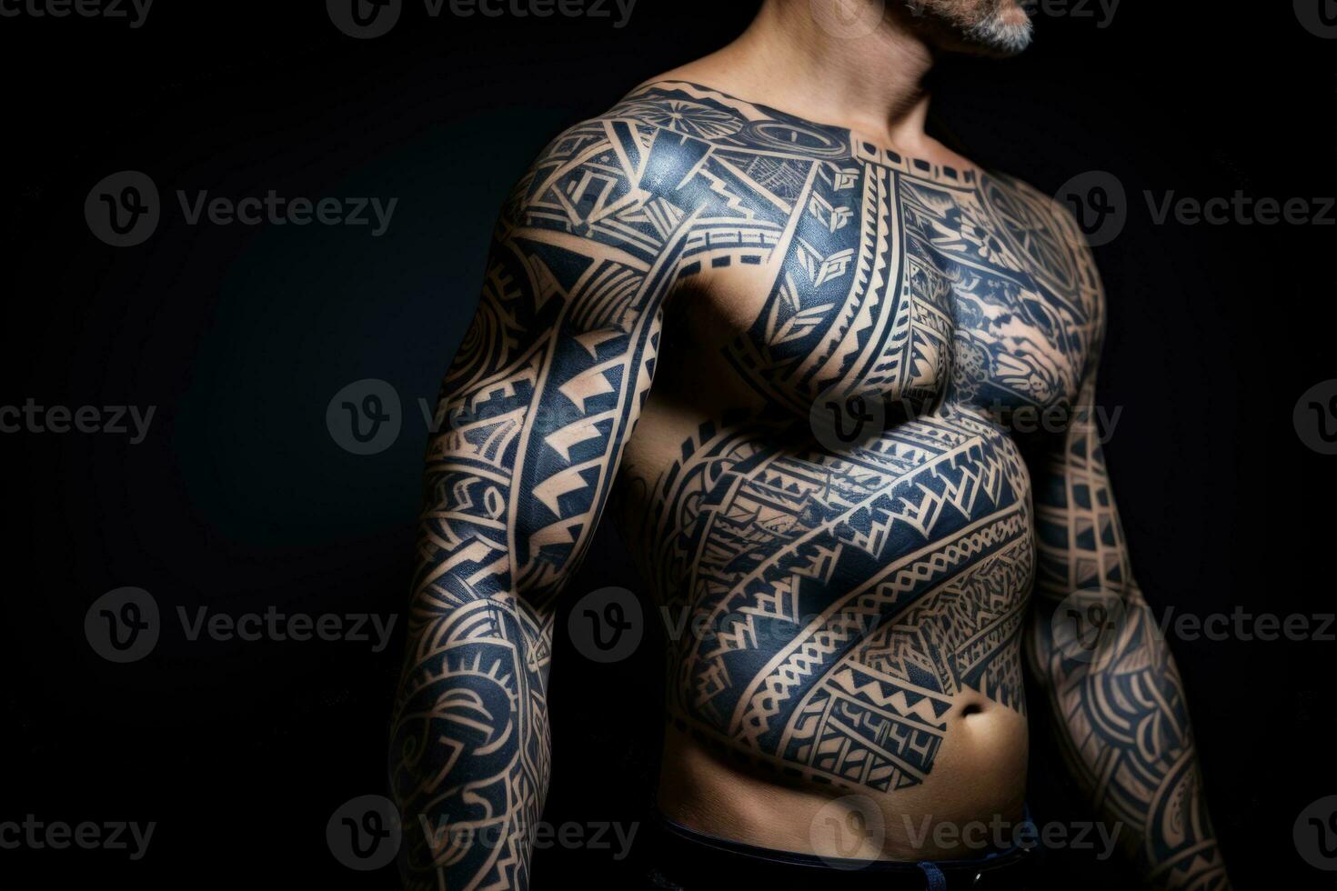 Monochrome ethnic tattoos emphasized with profound indigo and terracotta splashes photo