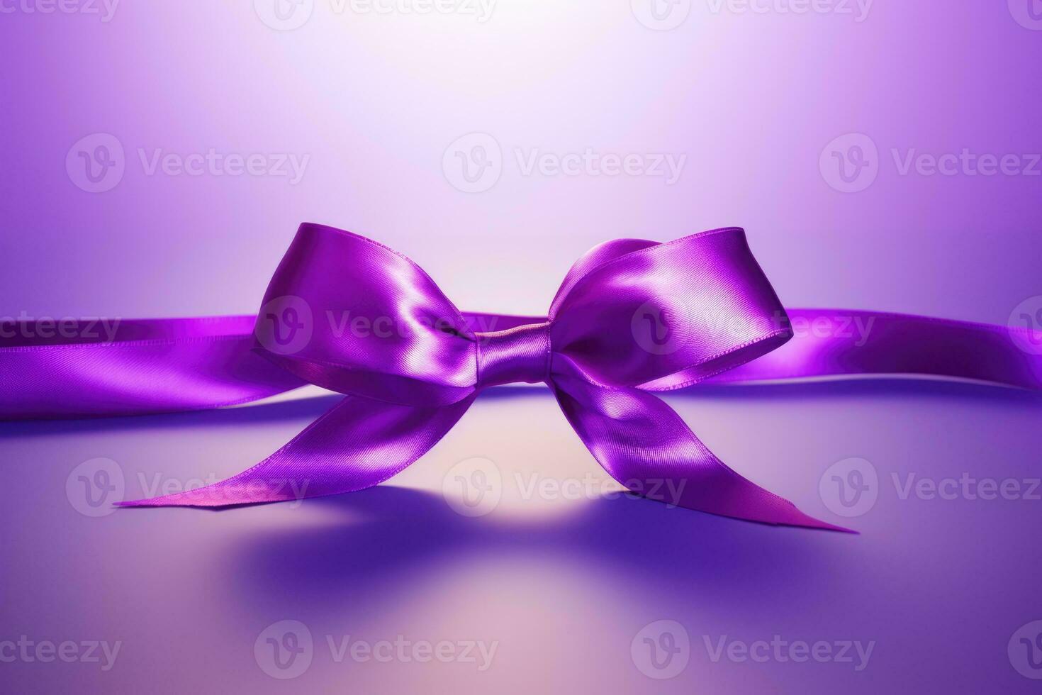 A purple ribbon symbolizing epilepsy awareness isolated on a gradient background photo