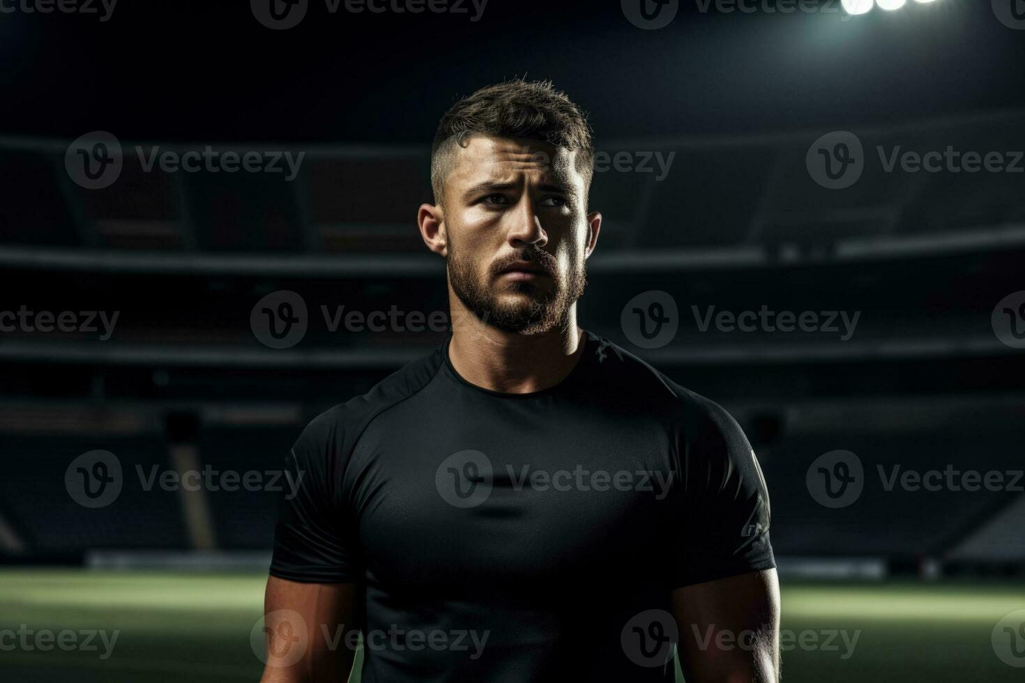 Dejected professional athlete on empty field background with space for text photo