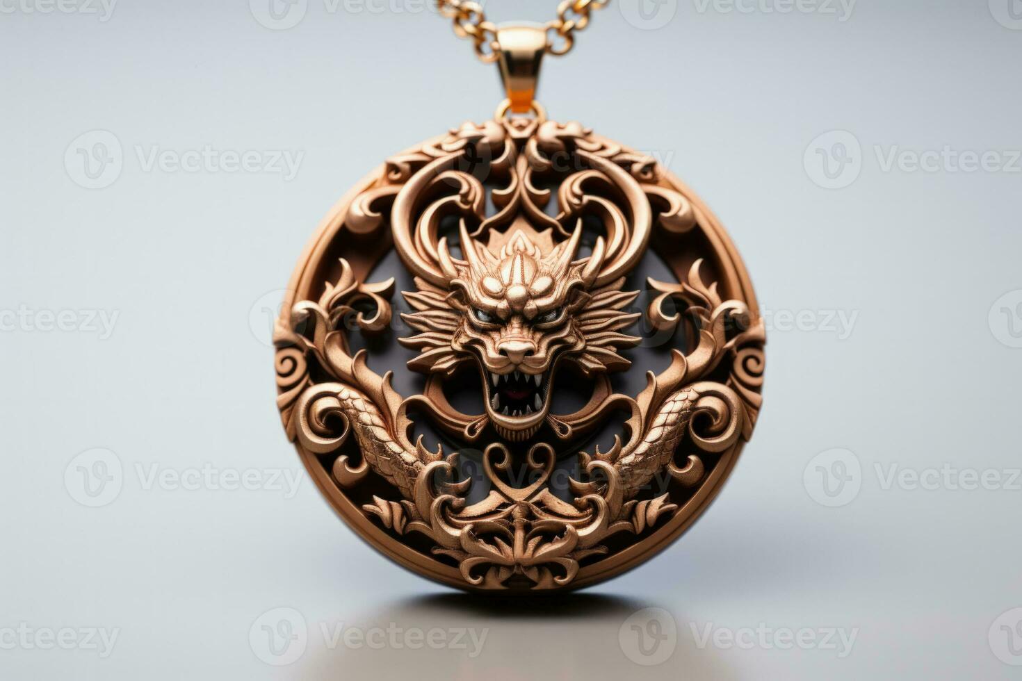 Dragon themed pendant necklace symbolising Year of the Dragon isolated on a white background photo